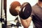 Closeup of dumbbell. young man lifting heavy weights. Sport equipment and workout concept. Body builder and Strength concept.