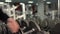 Closeup of dumbbells row, bodybuilding trainer picks gym equipment for beginner