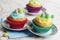 Closeup easter cupcakes on small plates