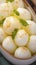 Closeup elongated Rasgulla, a classic Indian sweet indulgence.