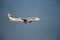 Closeup of an Embraer E190, operated by Finnair, on final approach during the sunset