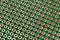 Closeup of empty green copper breadboard