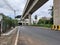 Closeup of empty roads due to covid 19 lockdown rules restriction, for transport in a Bangalore, Yelachenahalli Metro Station Road