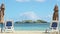 Closeup empty white sandy seashore with long beach chairs and closed umbrellas