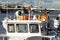 A closeup of an empty white tentbooth outside. ship`s rescue and signaling equipment.