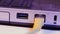 Closeup of Ethernet cable plug inserted into port on the side of
