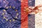 Closeup of EU and Serbia flags painted on a weathered rock wall background