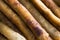 Closeup of a extra long sticks of Fried Lumpia or Filipino Spring Rolls