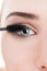 Closeup with eye and mascara wand