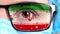 Closeup, eye, part of doctor face in medical mask, glasses, which painted in colors of Iran flag. Many viruses, germs