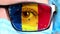 Closeup, eye, part of doctor face in medical mask, glasses, which painted in colors of Romania flag. Many viruses, germs