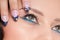 Closeup eyes make-up zone. Nail art