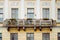 Closeup of the facade of a building in St. Petersburg. Beautiful balcony in retro style