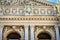 Closeup facade of Lviv opera and ballet theatre with different marble sculptures