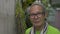 Closeup face portrait of healthy cheerful asian senior elderly wearing eyeglasses.