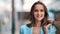 Closeup face of woman buyer standing with paper shopping bag. Medium close up shot on 4k RED camera