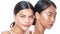 Closeup faces of two beautiful Asian women looking at the camera over white background