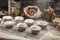 Closeup of falling powder sugar on chocolate muffins