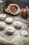 Closeup of falling powder sugar on fresh vanilla muffins