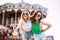 Closeup fashion lifestyle portrait of two pretty best friends girls, wearing bright swag style floral hats, mirrored sunglasses, h