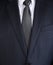 Closeup of a fashionable mens charcoal gray business suit