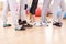 Closeup of Feet of Five Female Athletes Posing Together in Sport