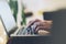 Closeup female freelancer sitting front open laptop computer with blank screen blue monitor, young business woman work on notebook