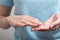 Closeup of a female hand in a cosmetic, cream. Protecting hands from the negative effects of the environment