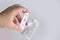 Closeup female hand holding test cassette, medical disposable sterile test kit for rapid test covid-19, concept of early detection