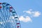 Closeup of a ferris wheel on a sunny day