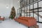 Closeup of Festive Christmas New year decoration in a modern loft interior with black windows and kitche