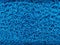 closeup of fine blue plastic wool melted together