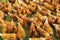 Closeup of a flock of brown chickens walking on the grass