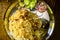 Closeup food photography of Handi Biryani, Asian traditional spicy rice meal served with Chicken, Mutton, Beef and vegetable salad