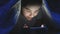 Closeup footage of girl lying under blanket at night and chatting on smartphone