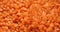 Closeup footage of natural dried red lentils flowing