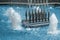 Closeup of fountain nozzles with water sprays and splashes. Aqua geysers in pool of waterworks