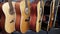 Closeup of four guitars Acoustic vintage style in music store