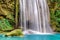 Closeup fragment of a powerful waterfall at Erawan waterfall, beautiful waterfall in deep forest, Erawan National Park