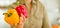 Closeup on fresh bell peppers in hand of young woman