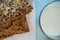 Closeup of fresh cookies with glass of milk