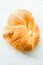 Closeup Fresh delicious croissant white background.