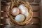 Closeup of fresh free range eggs in wicker basket