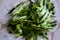 Closeup of fresh green cucumber peels on a table