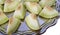 Closeup of fresh slices of yellow melon or cantaloupe on the old