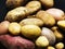 Closeup of fresh various organic potatoes