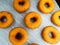 Closeup of freshly made dark brown doughnuts