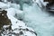 Closeup of frozen waterfall Godafoss, Iceland