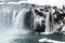 Closeup of frozen waterfall Godafoss, Iceland