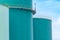 Closeup fuel storage tank in petroleum refinery. Blue big tank of oil storage. Fuel silo. Liquid petroleum tank. Petroleum oil